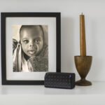 “Pure Beginnings.” A soft, joyful pencil drawing of a baby boy – the start of a beautiful journey, framed in innocence.